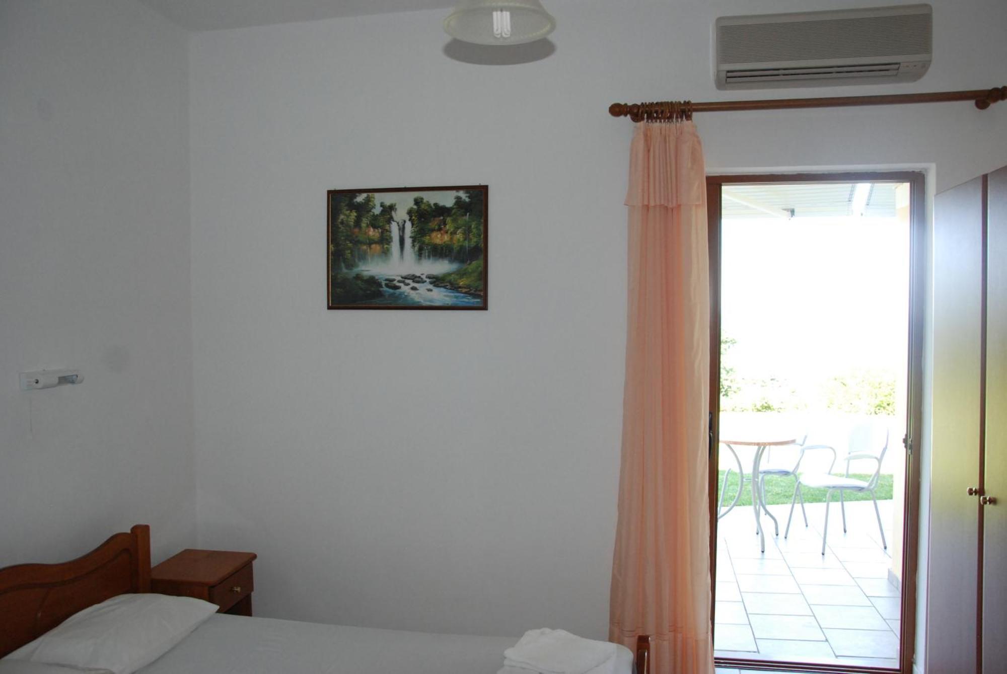 Artolithia Apartments Ríza Rum bild