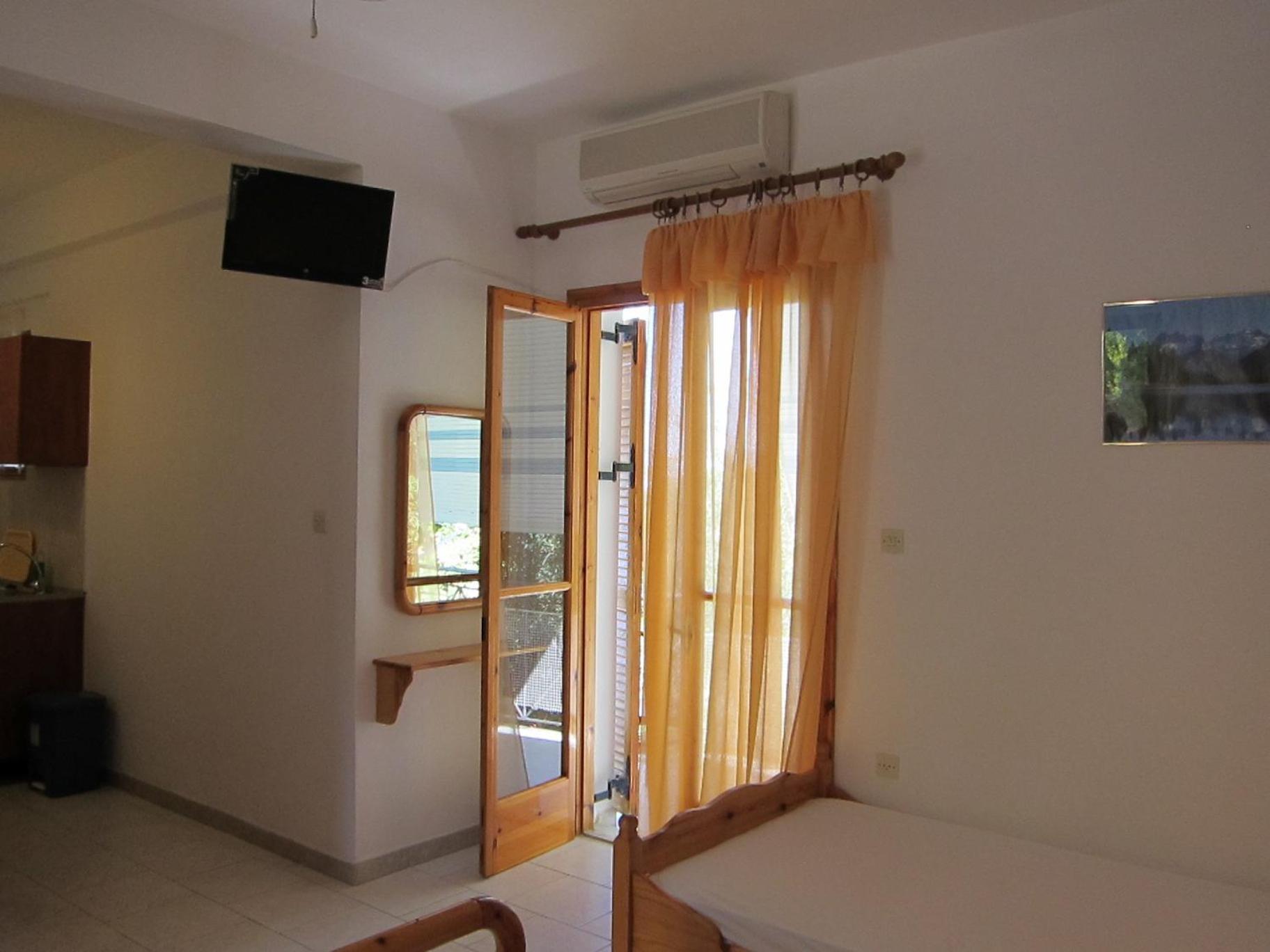 Artolithia Apartments Ríza Rum bild